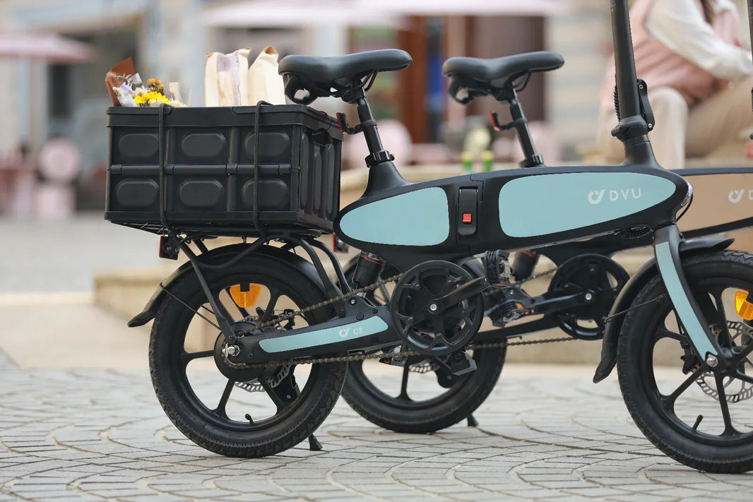 DYU C2 e-bike parked near office storage for European charging planning