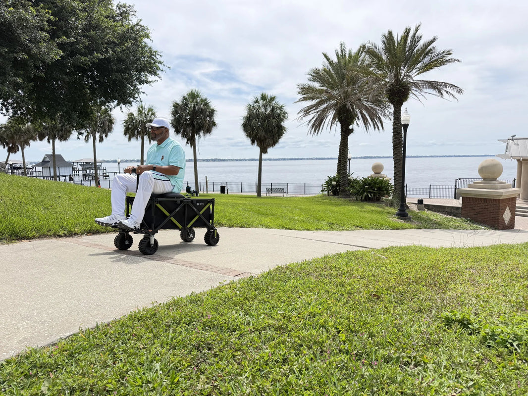 DYU campX electric wagon moving through a European park venue cleanup route