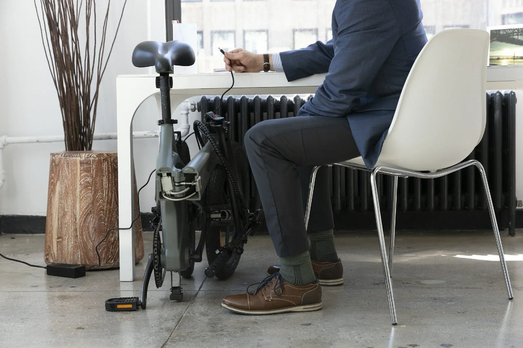 Man riding the DYU T1 folding e-bike indoors